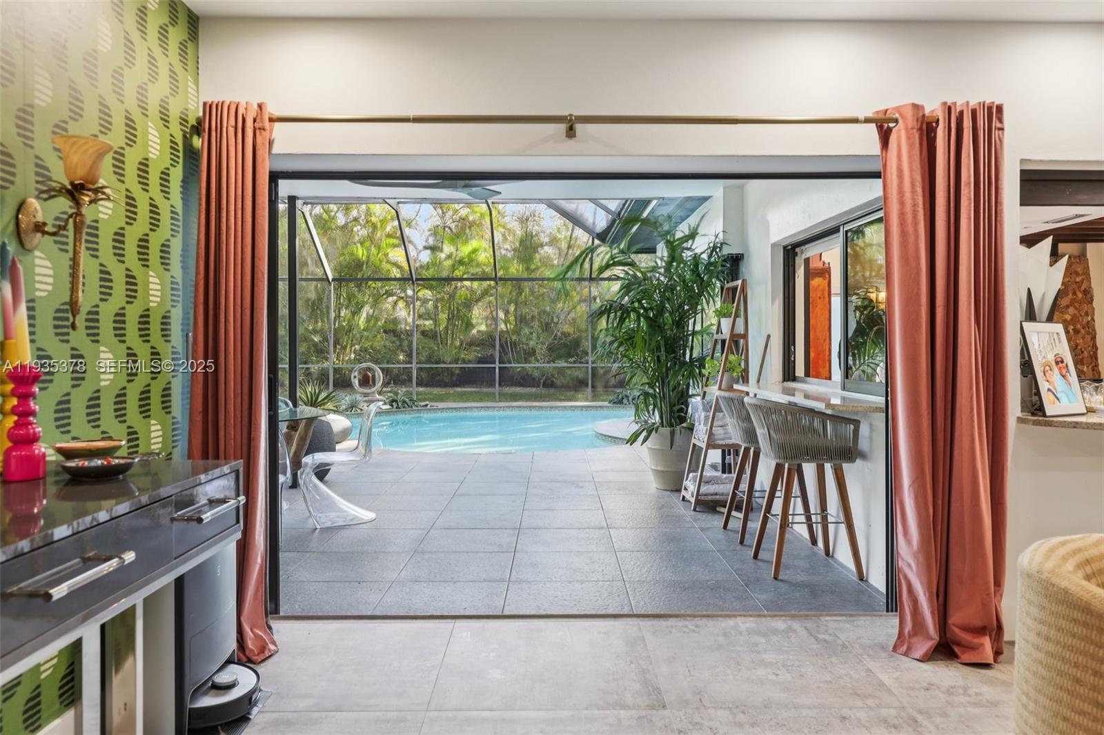 8375 Southwest 185th Terrace Cutler Bay, FL 33157 - Photo 17 of 35 a living room with large windows
