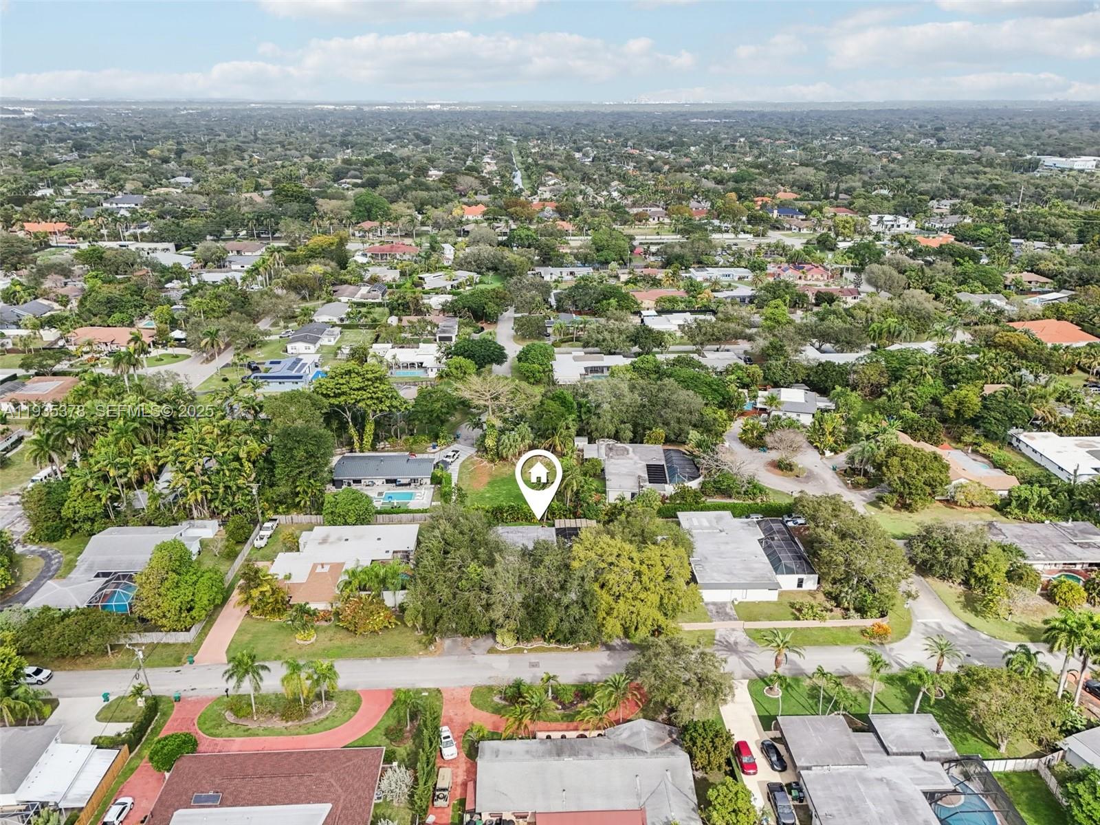 8375 Southwest 185th Terrace Cutler Bay, FL 33157 - Photo 33 of 35 an aerial view of residential building with green space