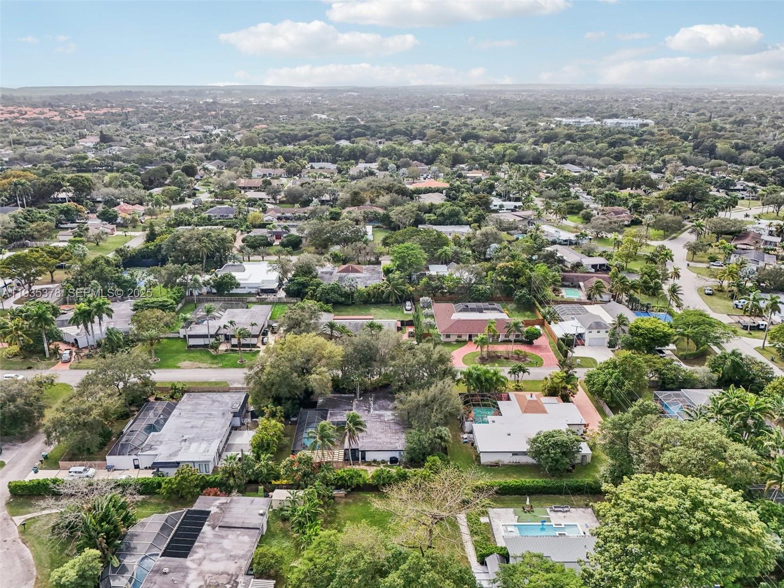 8375 Southwest 185th Terrace Cutler Bay, FL 33157 - Photo 34 of 35 an aerial view of residential houses with city view
