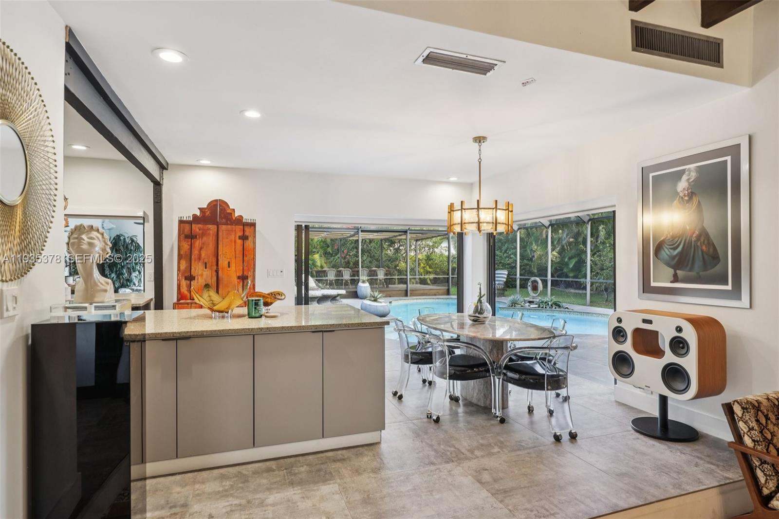 8375 Southwest 185th Terrace Cutler Bay, FL 33157 - Photo 5 of 35 a dining hall with stainless steel appliances granite countertop a stove and a sink