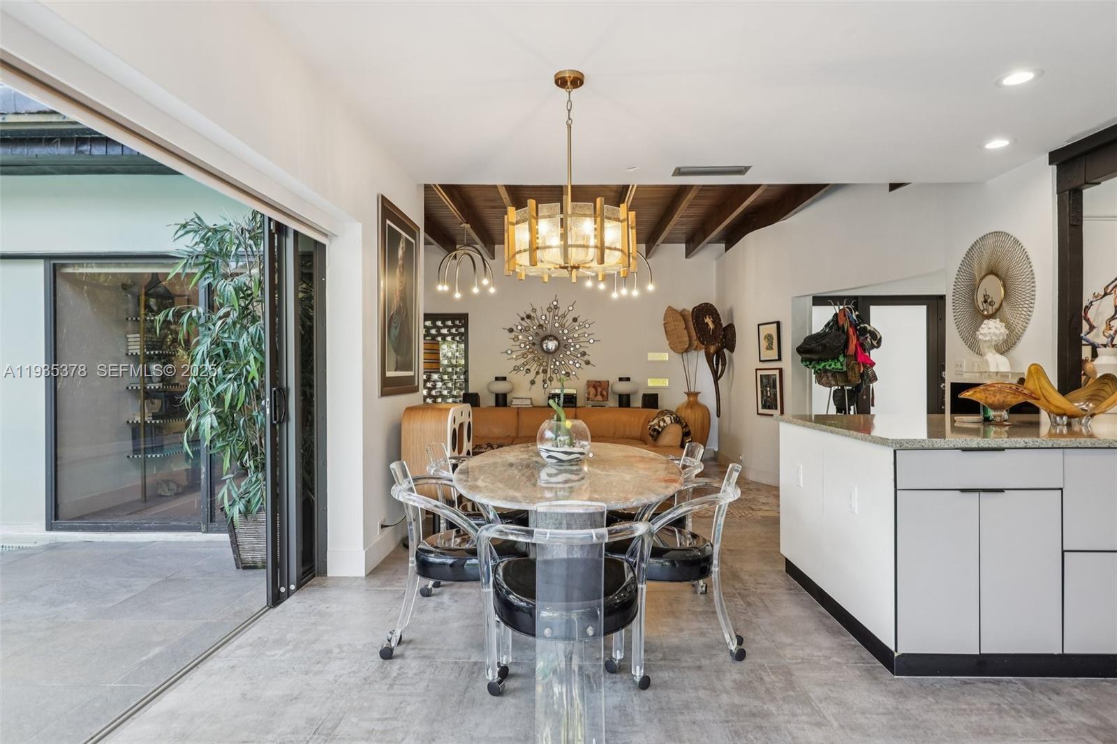 8375 Southwest 185th Terrace Cutler Bay, FL 33157 - Photo 6 of 35 a dining room with furniture and window