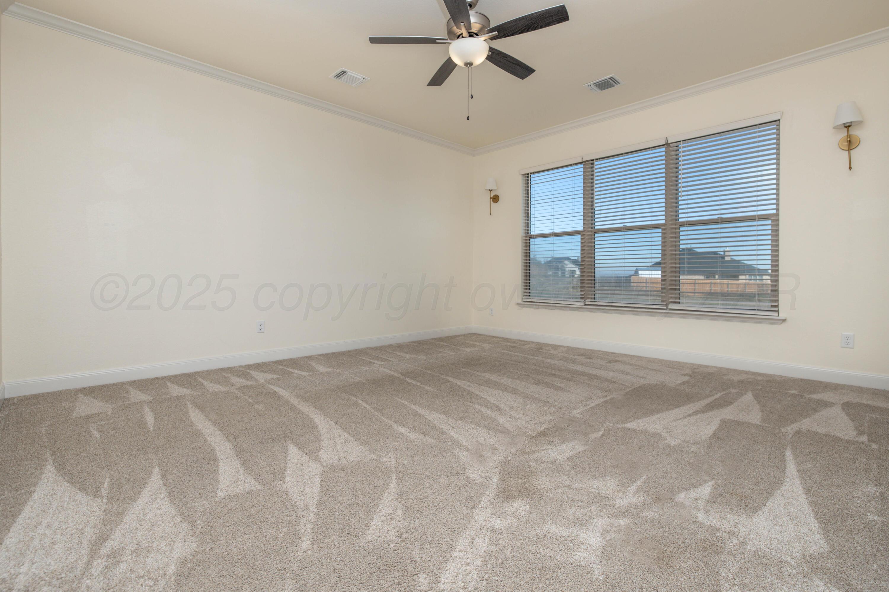 19350 Falcon Ridge Road Amarillo, TX 79124 - Photo 20 of 41 a view of an empty room with a window