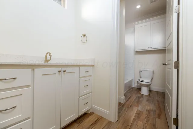a view of a kitchen from the hallway