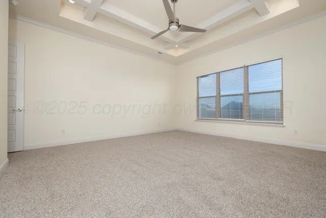 an empty room with a empty space and windows