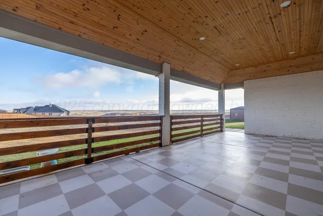 a view of outdoor space with lounge chair
