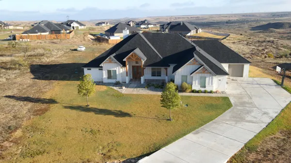 a view of a house with a ocean view