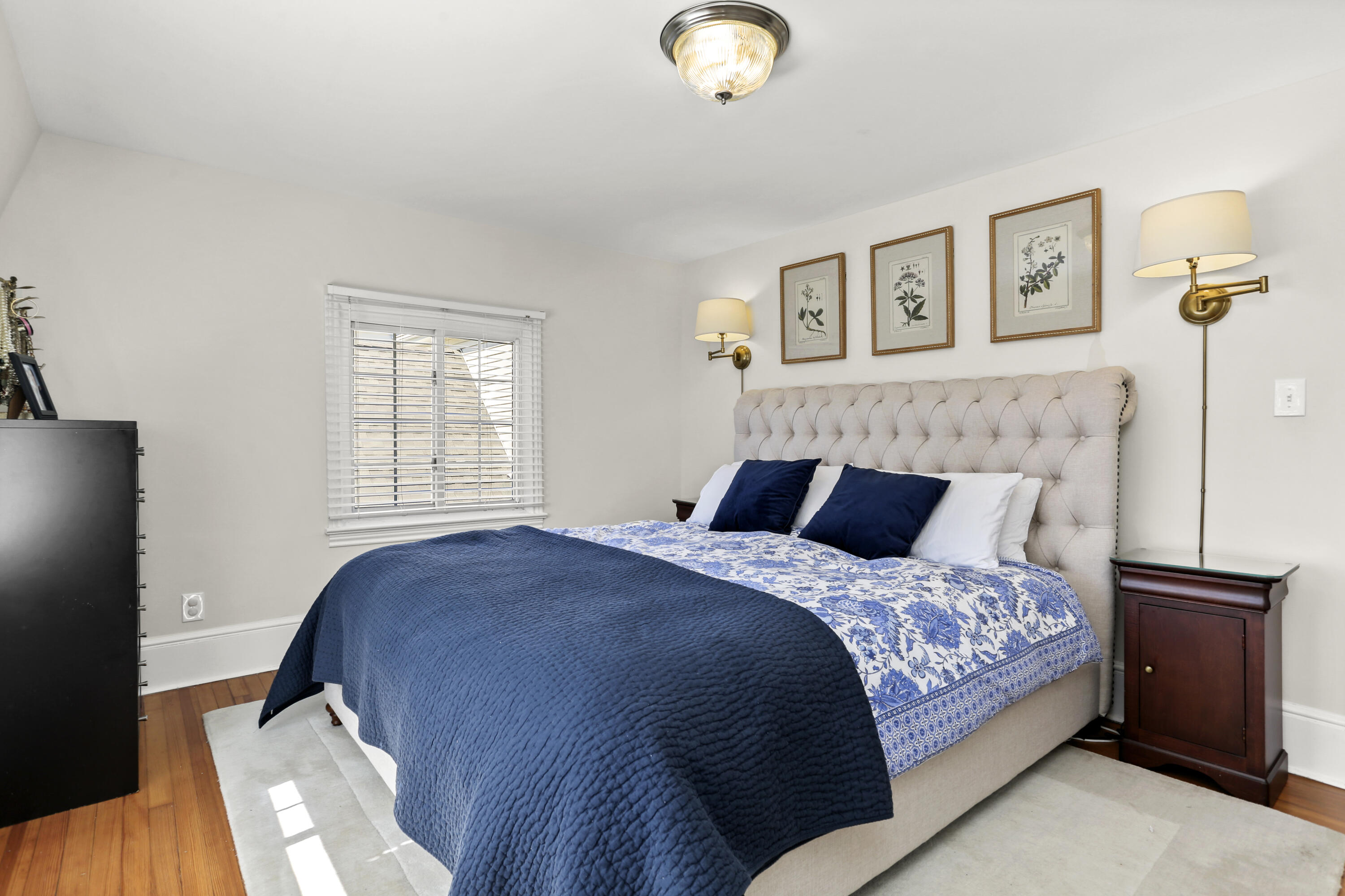 5 Hazel Street Norwalk, CT 06851 - Photo 19 of 32 a bedroom with a large bed and a window