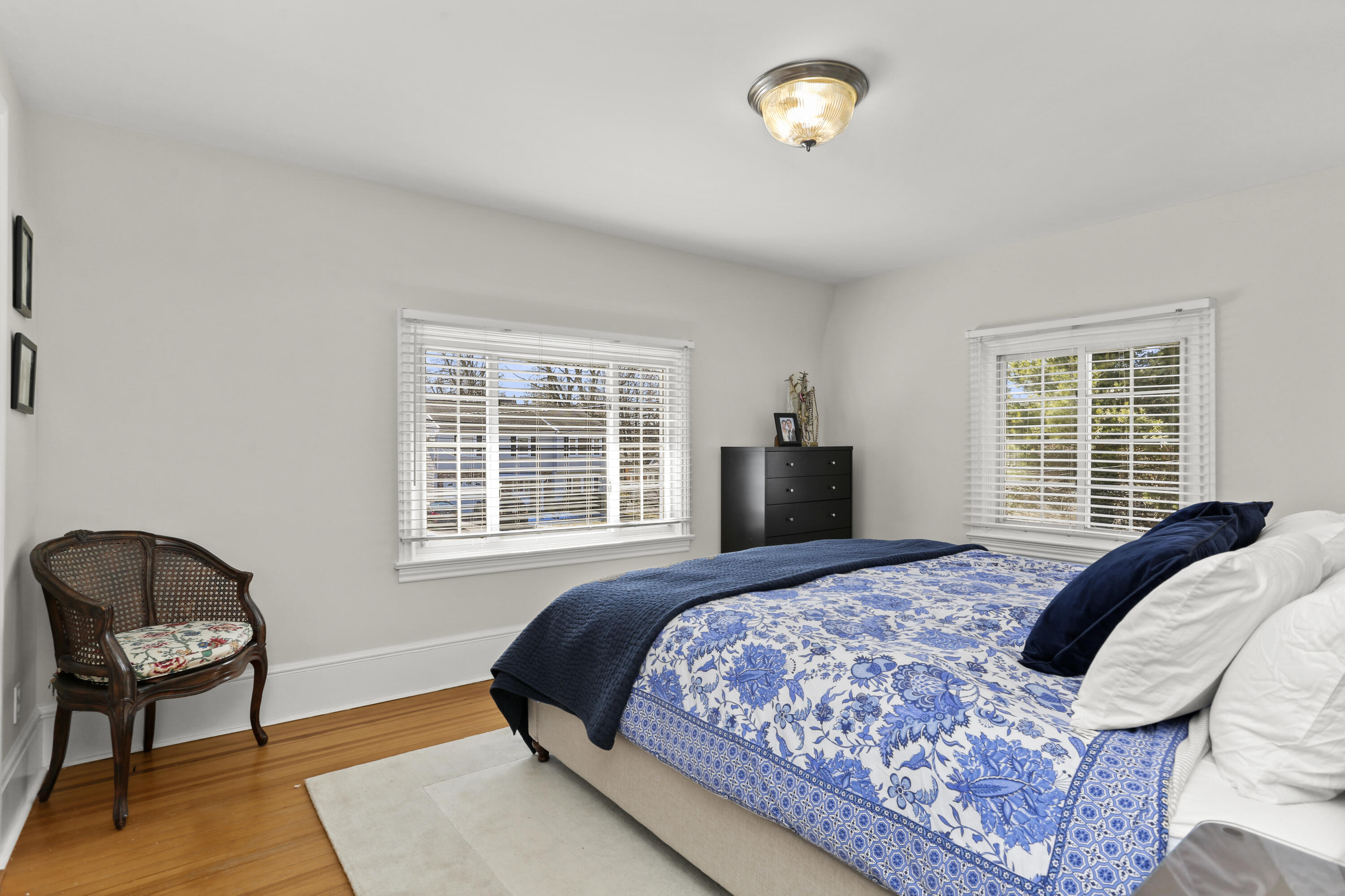5 Hazel Street Norwalk, CT 06851 - Photo 20 of 32 a bedroom with a bed and a chair