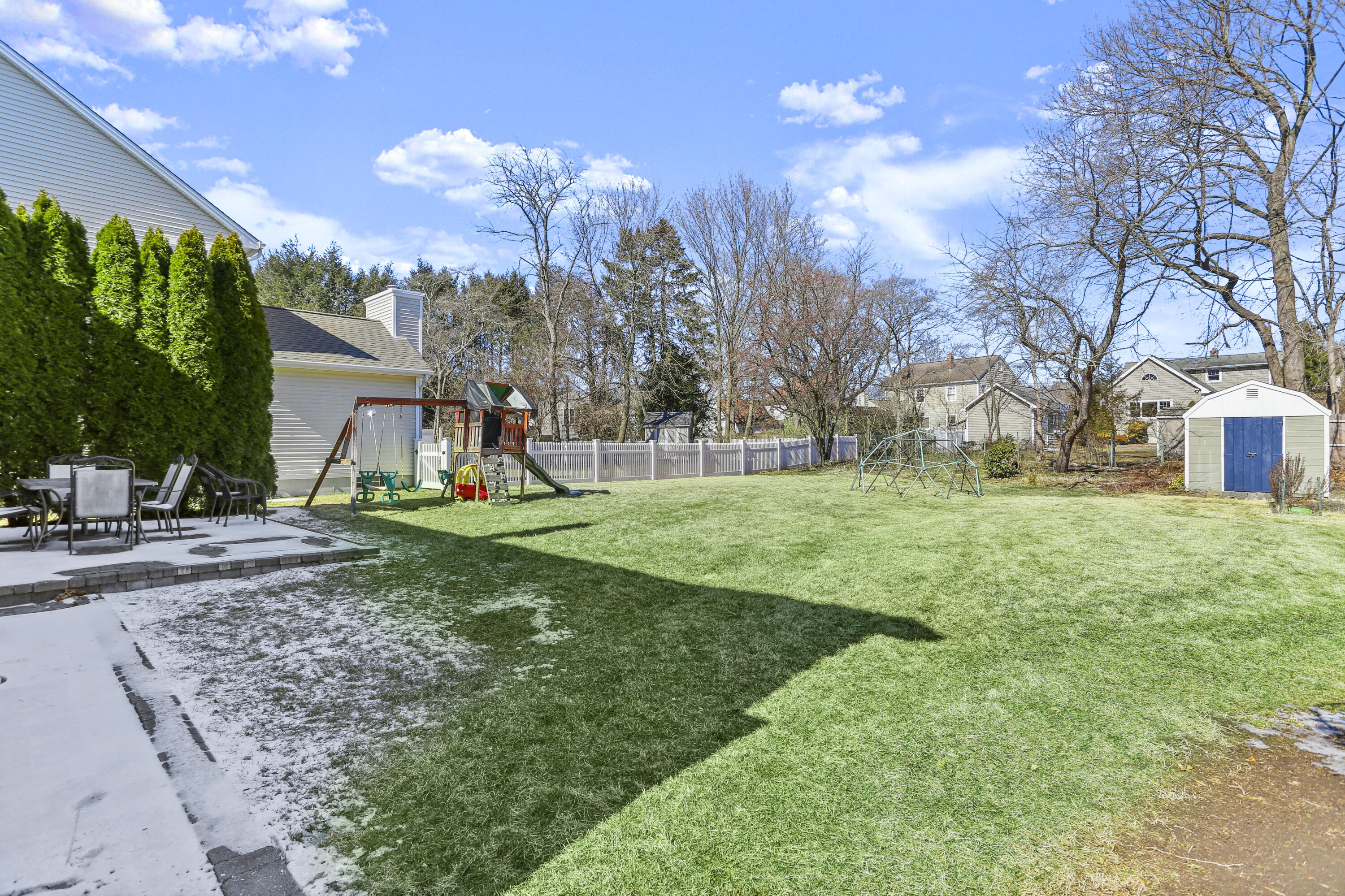 5 Hazel Street Norwalk, CT 06851 - Photo 28 of 32 a view of a house with a big yard and large trees