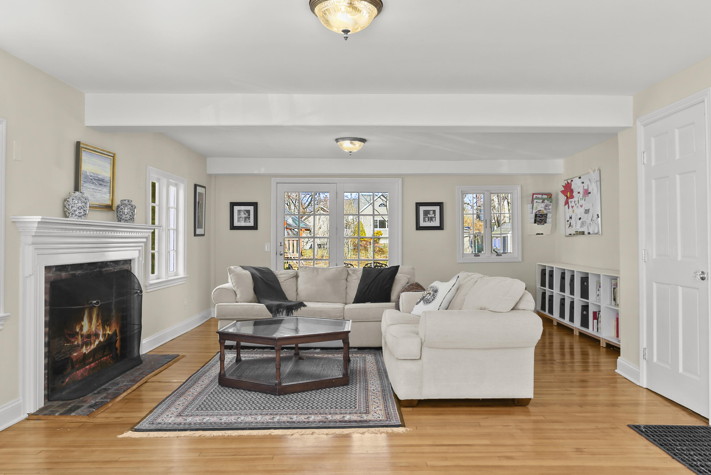 5 Hazel Street Norwalk, CT 06851 - Photo 7 of 32 a living room with furniture and a fireplace