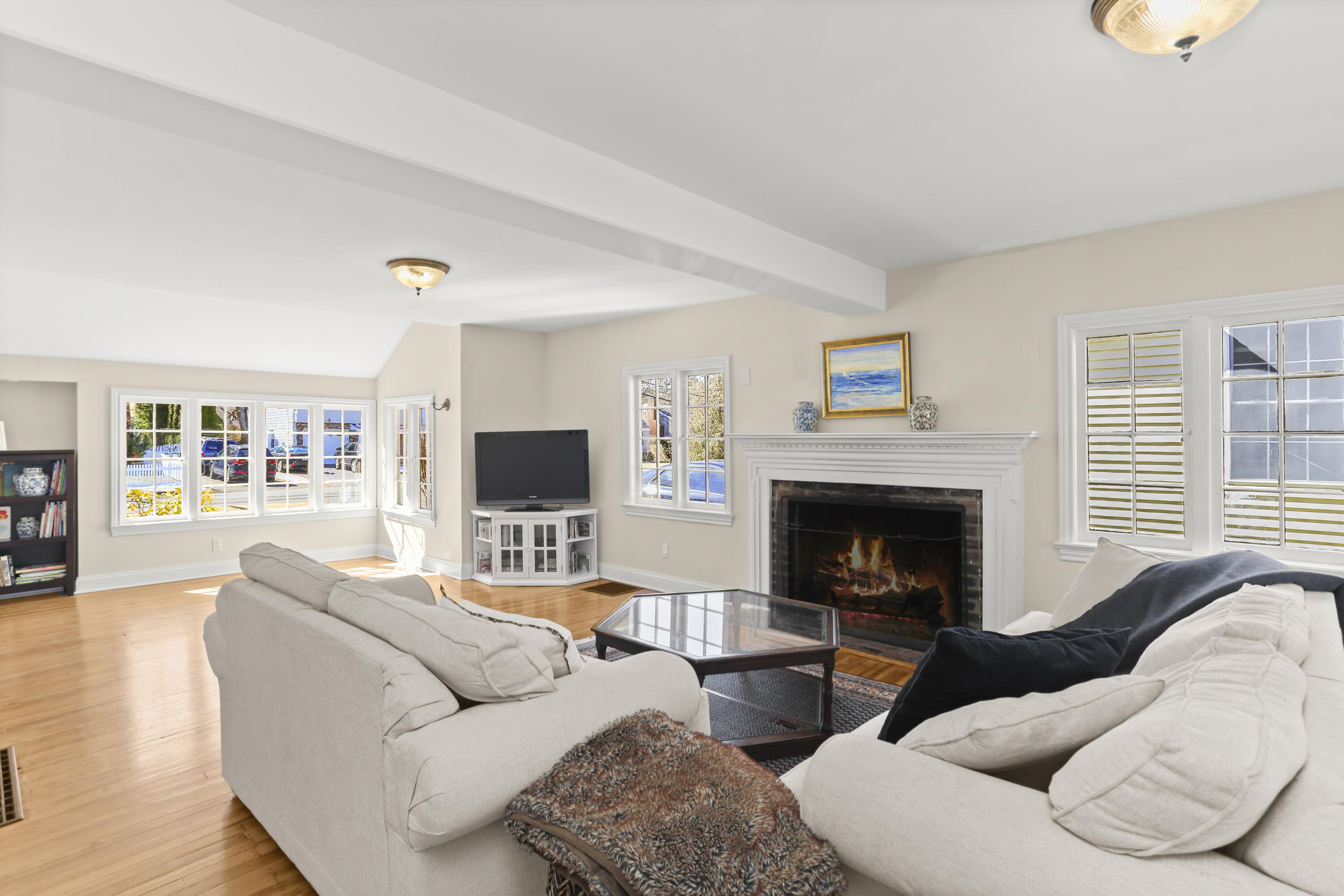 5 Hazel Street Norwalk, CT 06851 - Photo 8 of 32 a living room with furniture and a fireplace