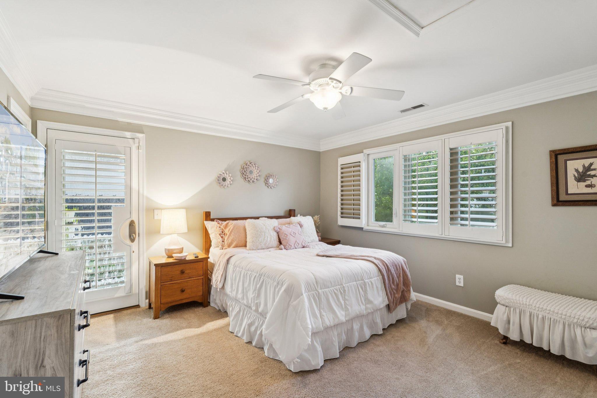 47660 Pennrun Way Sterling, VA 20165 - Photo 18 of 55 a bedroom with a bed and a window