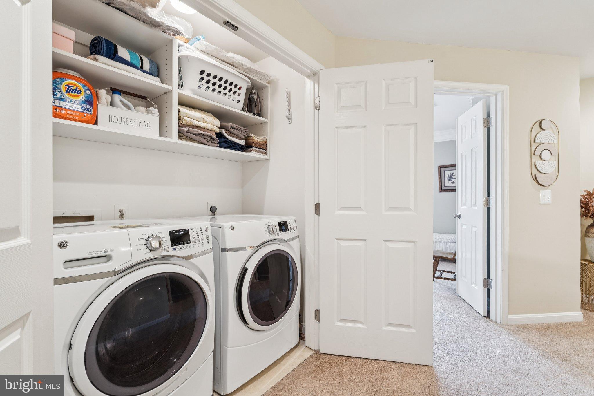 47660 Pennrun Way Sterling, VA 20165 - Photo 22 of 55 Efficient laundry space with organized storage.