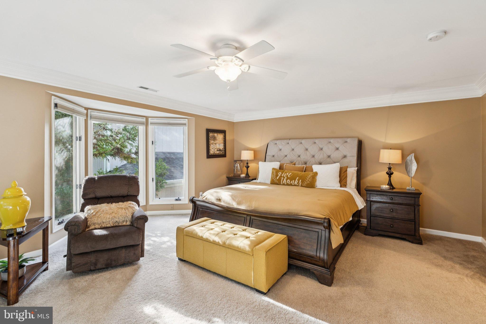 47660 Pennrun Way Sterling, VA 20165 - Photo 24 of 55 a bedroom with a bed couch and window