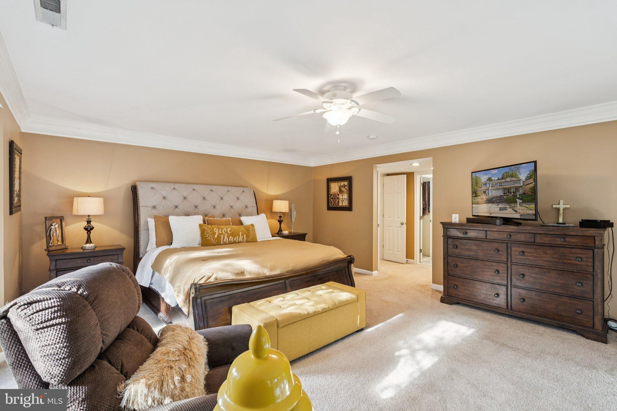 47660 Pennrun Way Sterling, VA 20165 - Photo 25 of 55 a bedroom with a bed and wooden floor