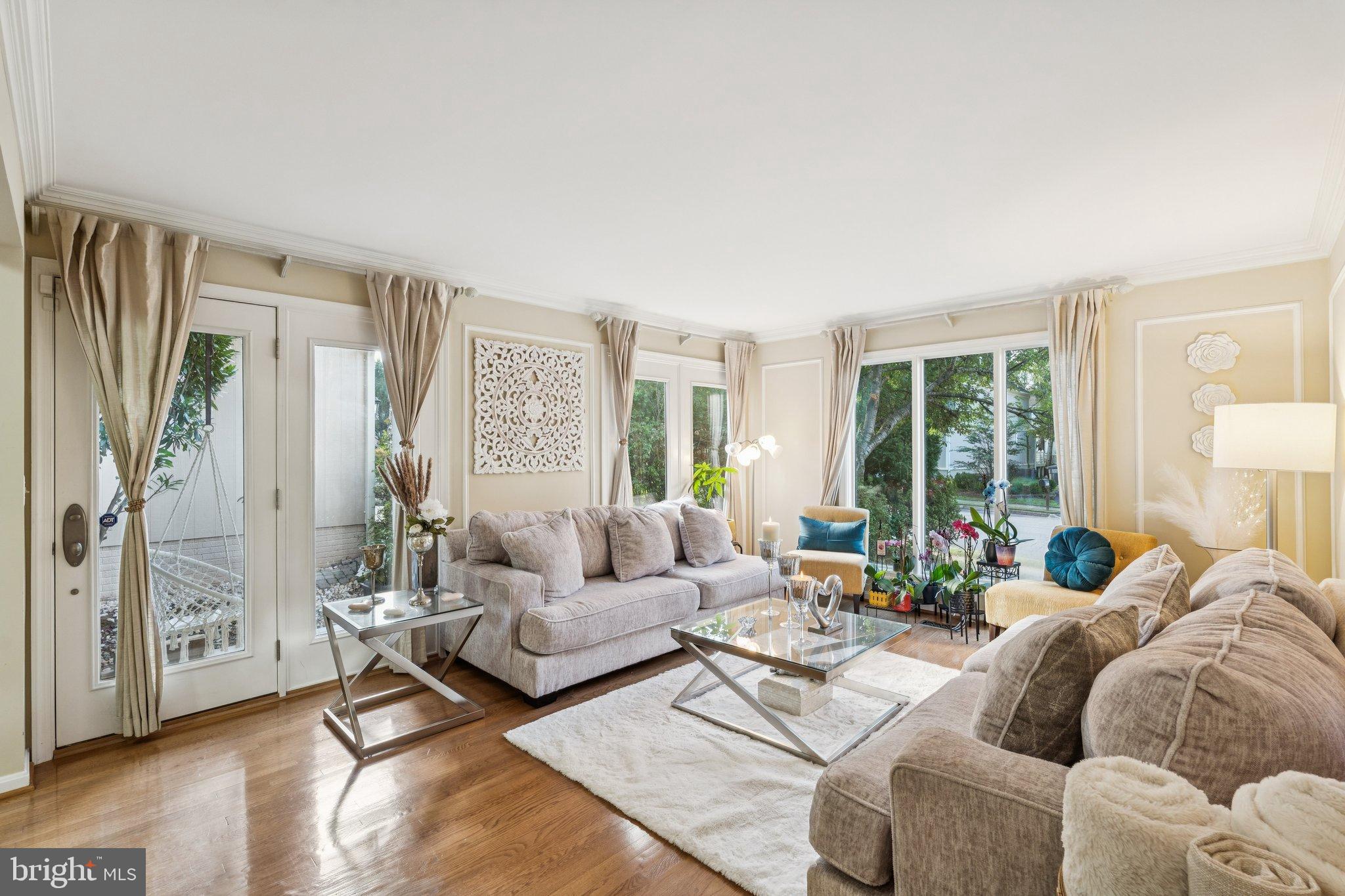47660 Pennrun Way Sterling, VA 20165 - Photo 33 of 55 a living room with furniture and a large window