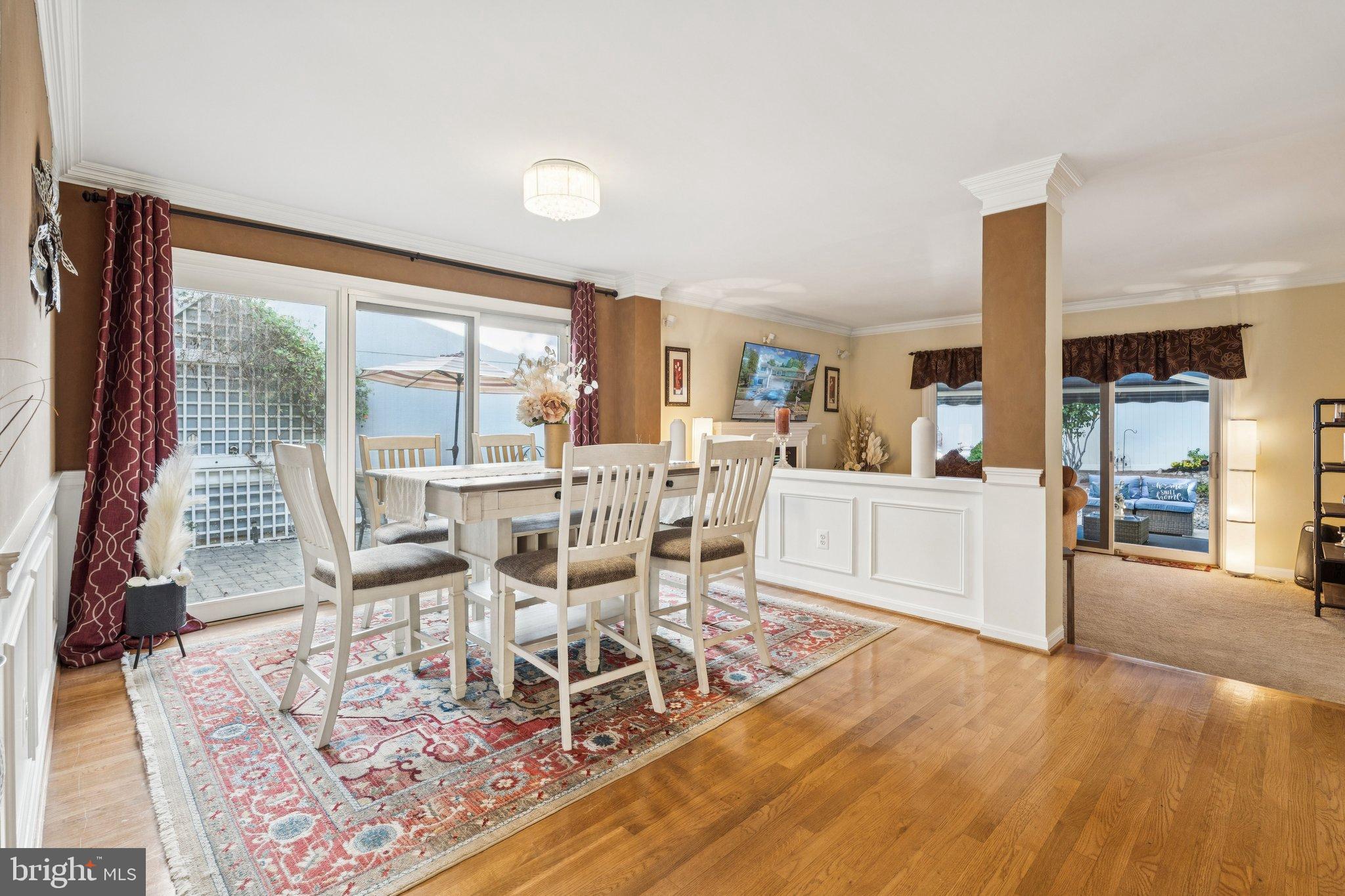 47660 Pennrun Way Sterling, VA 20165 - Photo 36 of 55 a view of a dining room with furniture and wooden floor