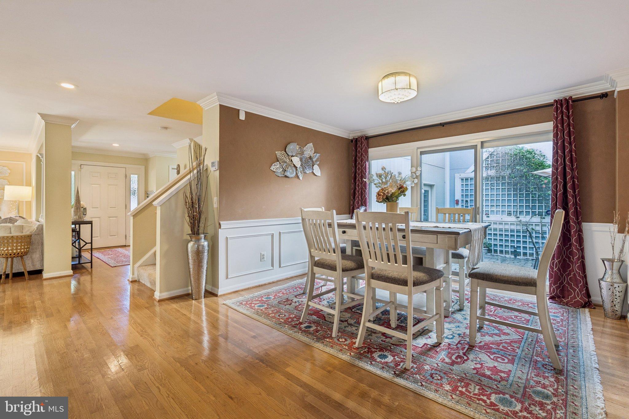 47660 Pennrun Way Sterling, VA 20165 - Photo 37 of 55 a dining room with furniture and wooden floor