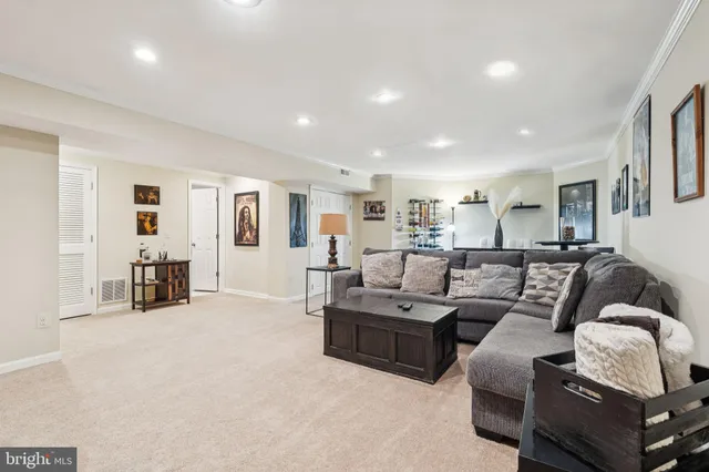 a living room with furniture and a area