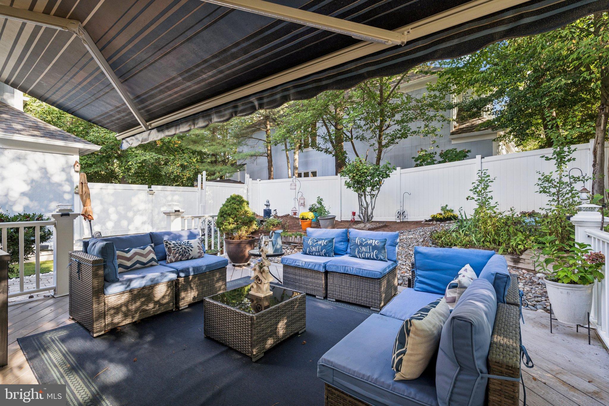 47660 Pennrun Way Sterling, VA 20165 - Photo 45 of 55 a outdoor living space with furniture and a garden