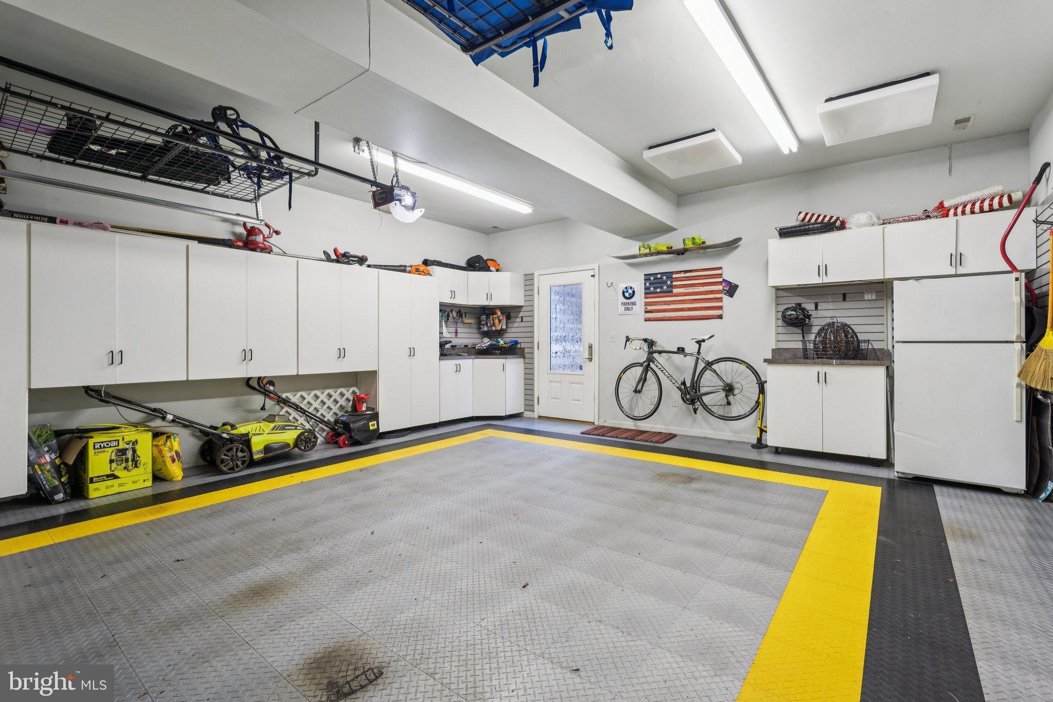 47660 Pennrun Way Sterling, VA 20165 - Photo 52 of 55 Spacious garage with organized storage.