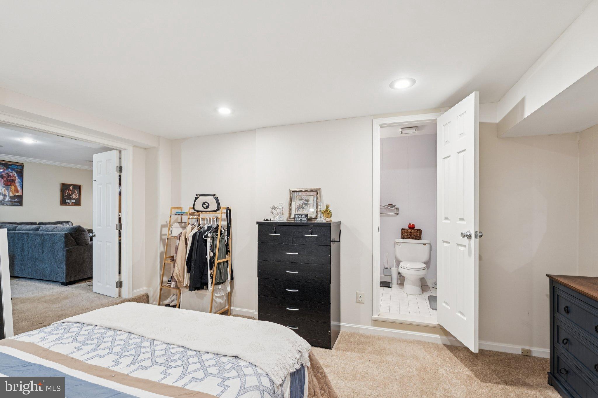 47660 Pennrun Way Sterling, VA 20165 - Photo 9 of 55 a bedroom with a bed and a closet