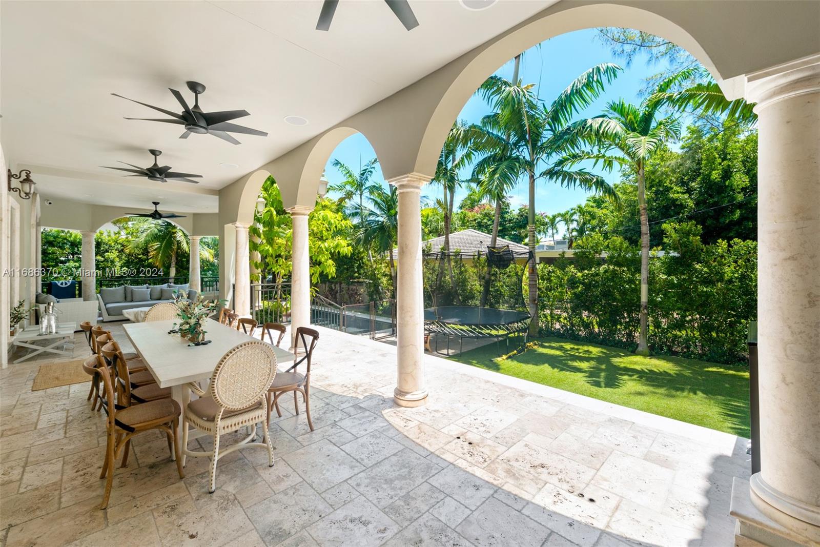 250 Buttonwood Drive Key Biscayne, FL 33149 - Photo 29 of 39 a view of a patio with a garden