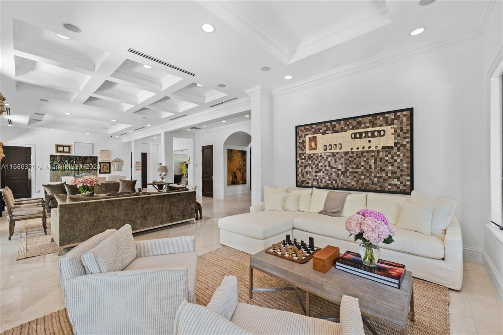 250 Buttonwood Drive Key Biscayne, FL 33149 - Photo 10 of 39 a living room with furniture and a rug