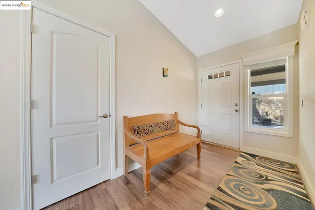 a living room with furniture fireplace and a flat screen tv
