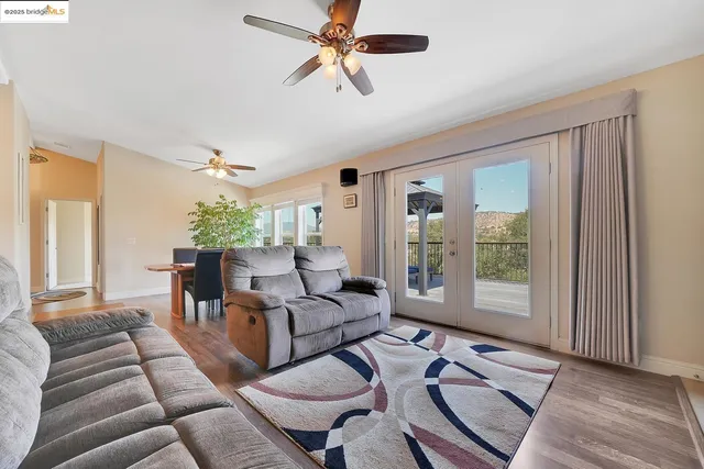 a bedroom with furniture and a potted plant