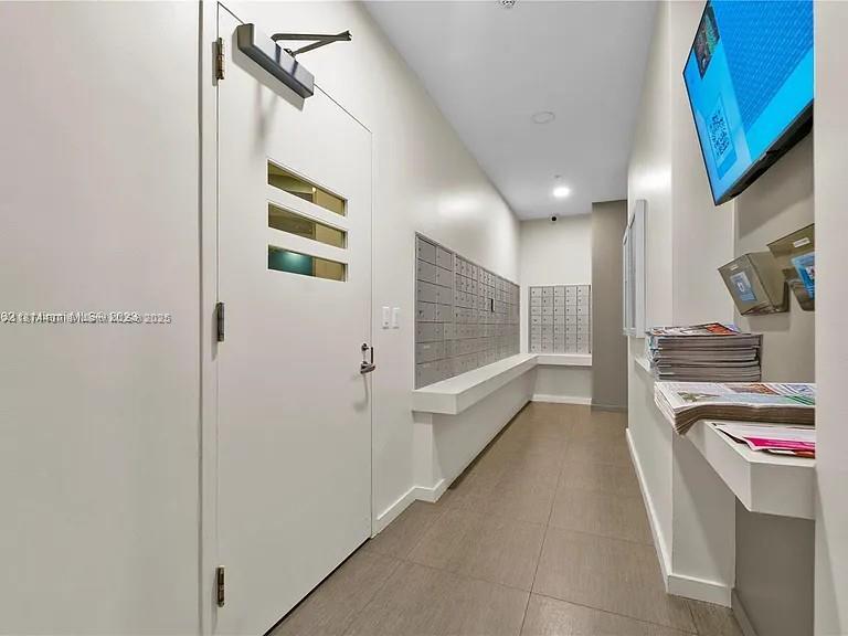 1900 North Bayshore Drive, Unit 3507 Miami, FL 33132 - Photo 15 of 22 a view of hallway with stairs and furniture