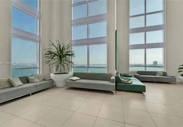 a lobby with furniture and floor