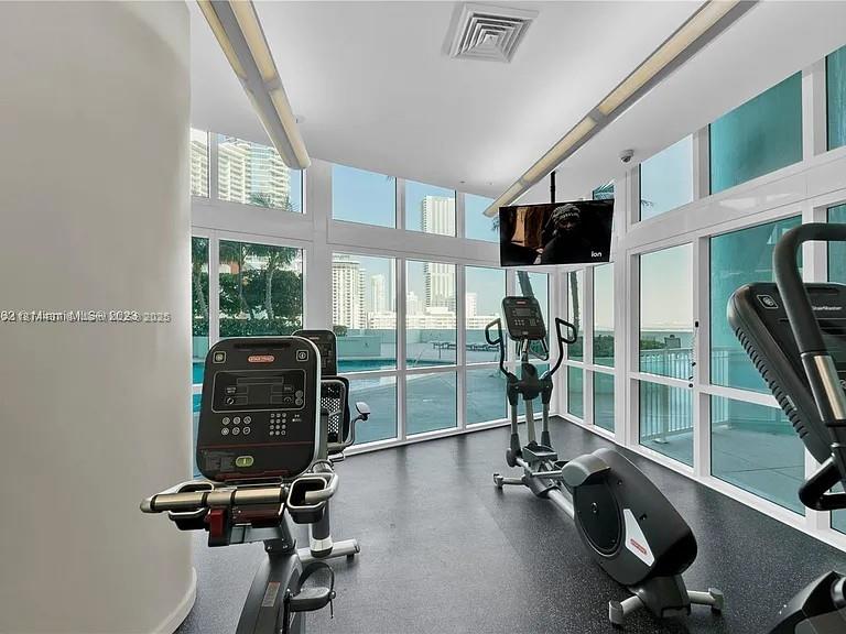 1900 North Bayshore Drive, Unit 3507 Miami, FL 33132 - Photo 6 of 22 a view of a room with gym equipment