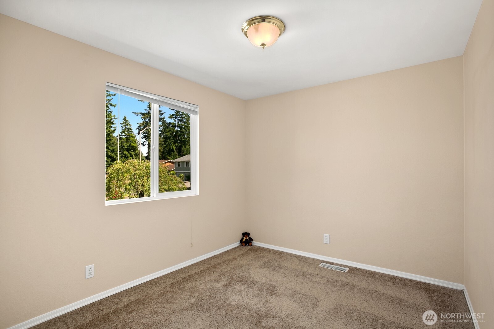 4206 Southeast 1st Place Renton, WA 98059 - Photo 13 of 25 an empty room with a window