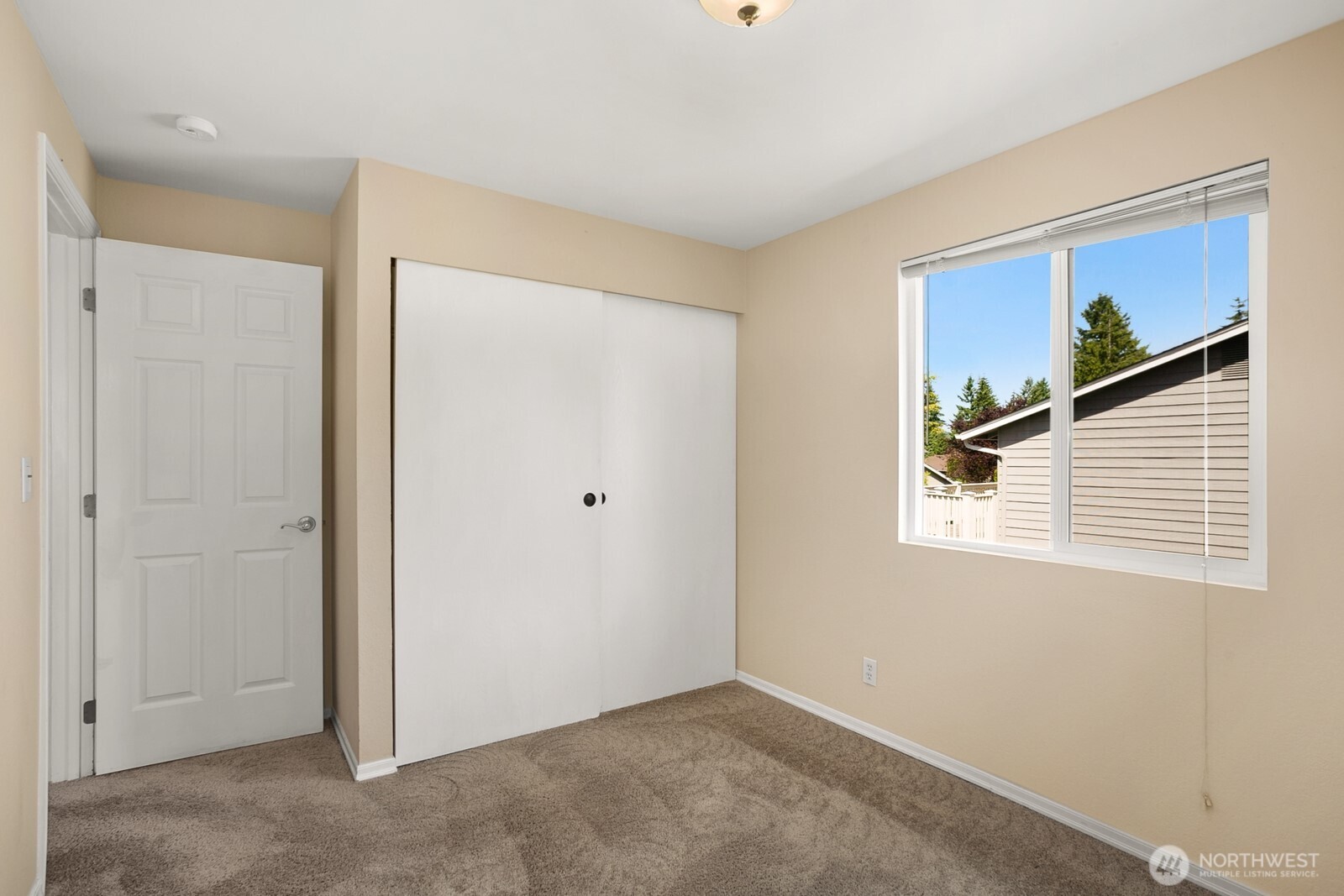 4206 Southeast 1st Place Renton, WA 98059 - Photo 14 of 25 a view of an empty room with a window