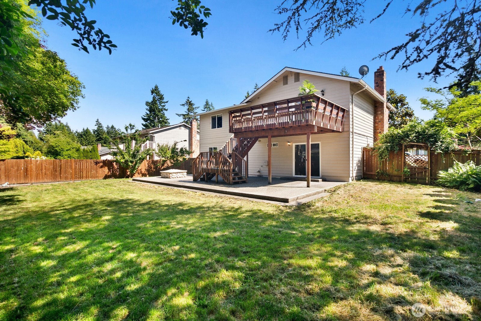 4206 Southeast 1st Place Renton, WA 98059 - Photo 23 of 25 a front view of a house with a yard