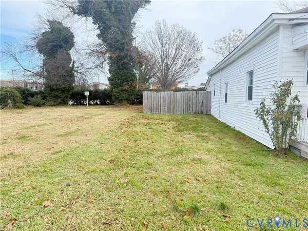 a view of backyard with green space