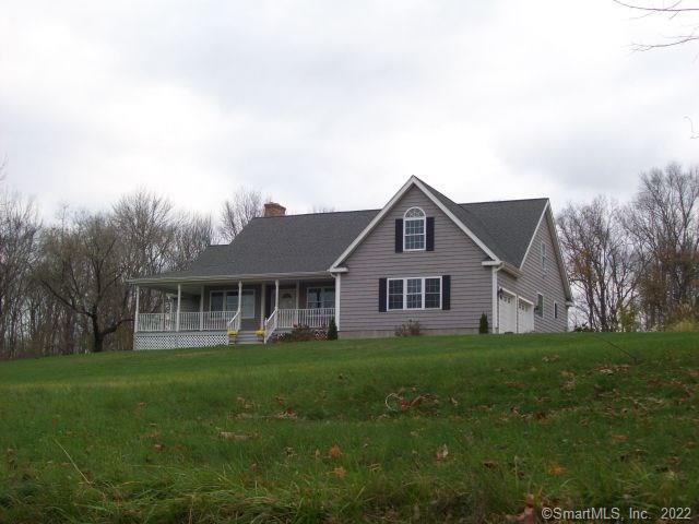 1 Salt Rock Road Sprague, CT 06330 - Photo 1 of 1 a front view of house with yard and green space