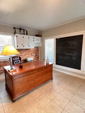 a view of kitchen with cabinets