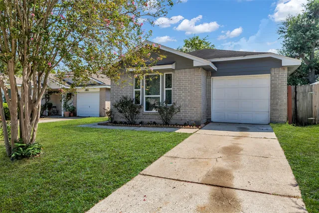 a front view of house with yard