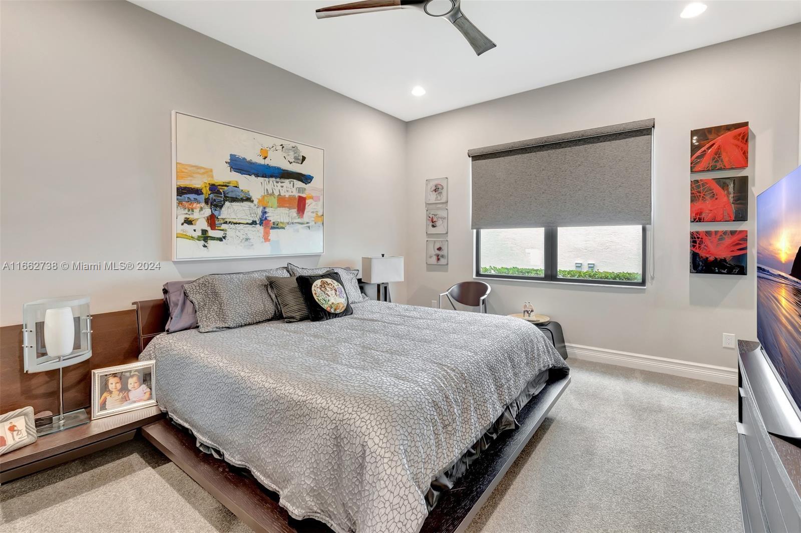 17430 Rosella Road Boca Raton, FL 33496 - Photo 14 of 23 a bedroom with bed and window