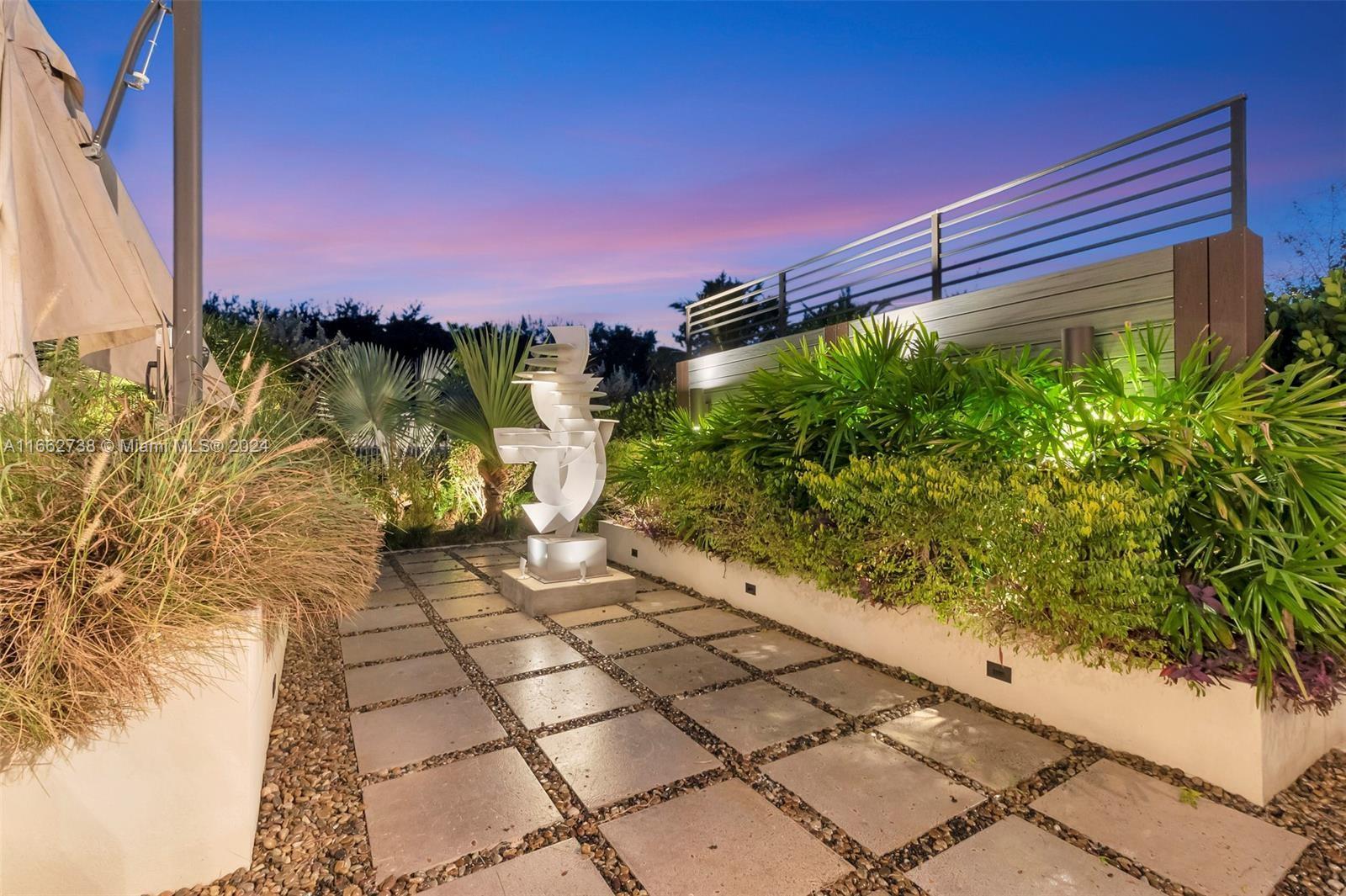 17430 Rosella Road Boca Raton, FL 33496 - Photo 18 of 23 a view of a pathway both side of house