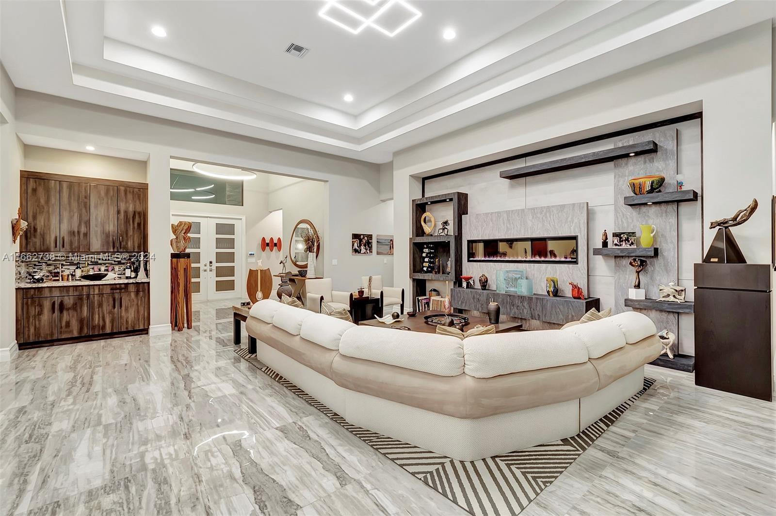 17430 Rosella Road Boca Raton, FL 33496 - Photo 6 of 23 a living room with furniture and a large window