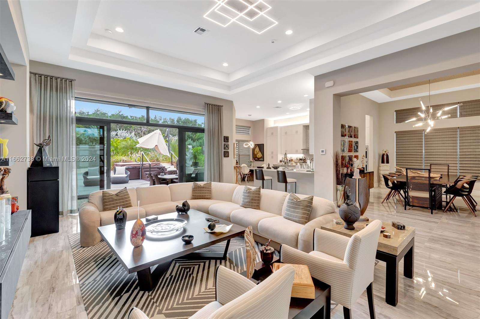 17430 Rosella Road Boca Raton, FL 33496 - Photo 7 of 23 a living room with furniture and a large window