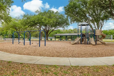 a view of a park with swings