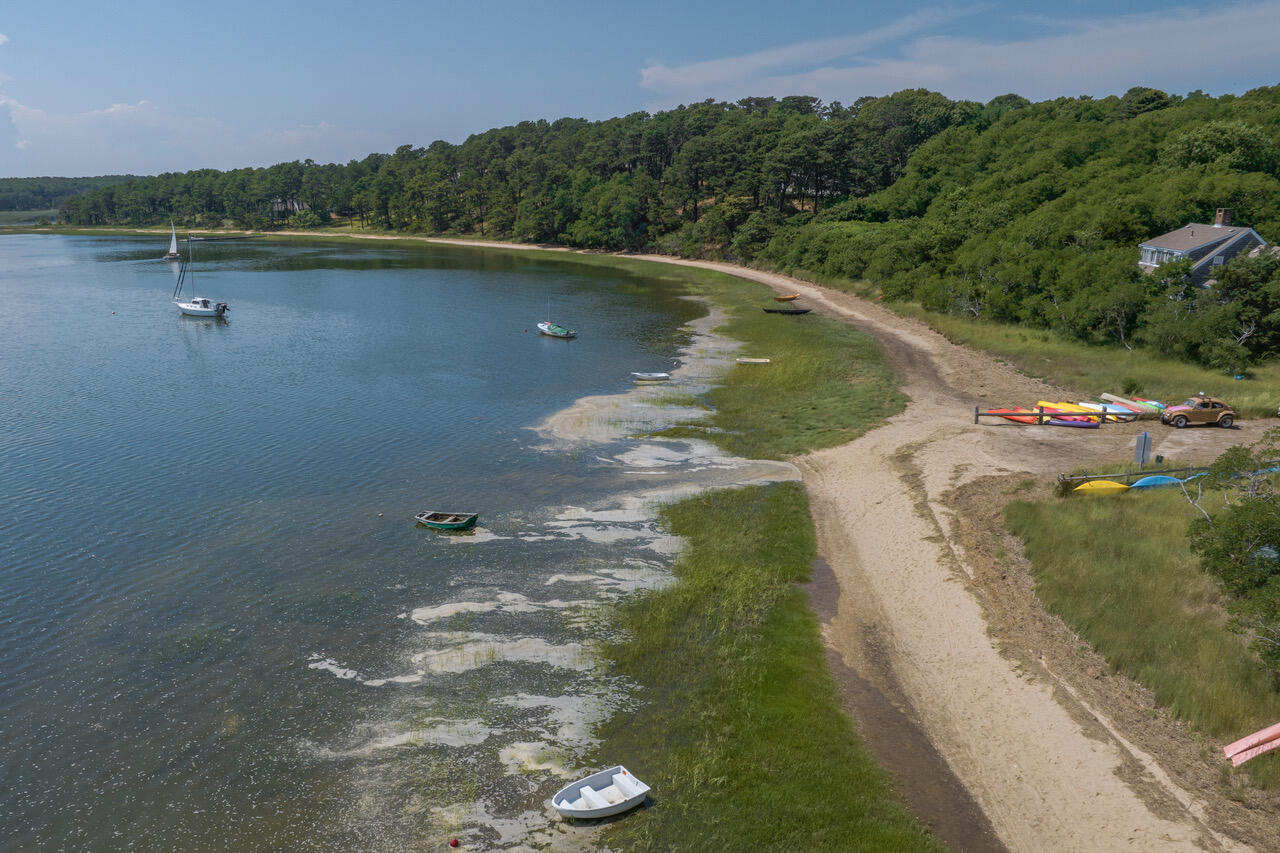 30 Amy's Way Wellfleet, MA 02667 - Photo 12 of 64 a view of a lake with a yard