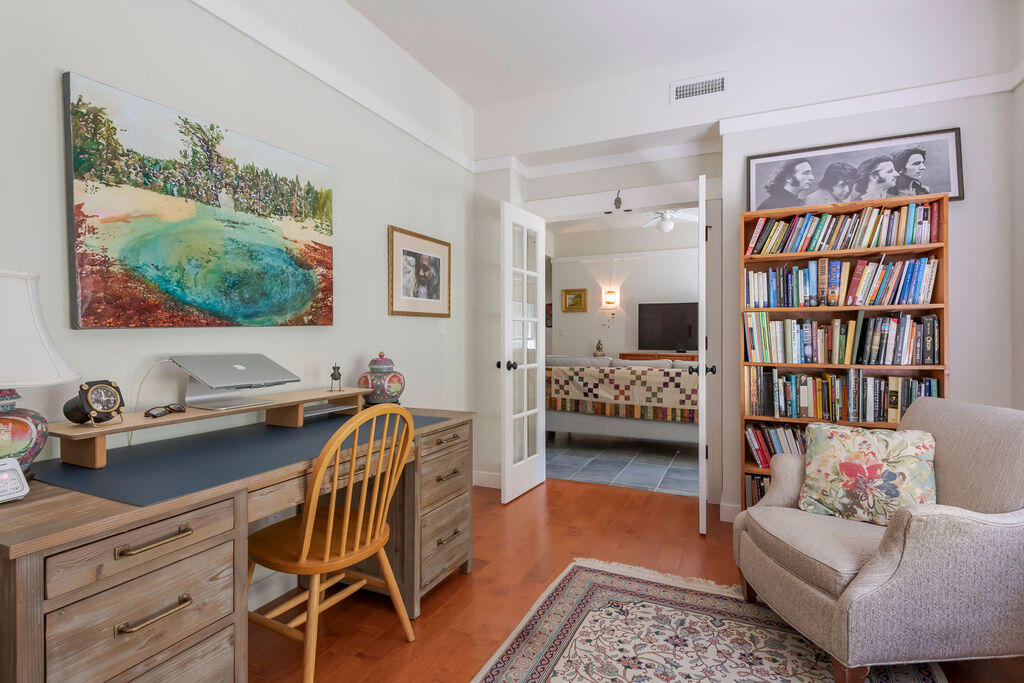 30 Amy's Way Wellfleet, MA 02667 - Photo 40 of 64 a living room with furniture and a book shelf