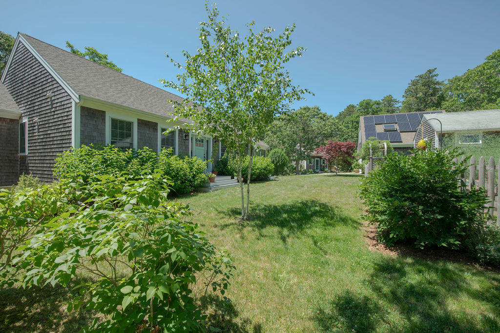 30 Amy's Way Wellfleet, MA 02667 - Photo 8 of 64 a view of a house with a yard