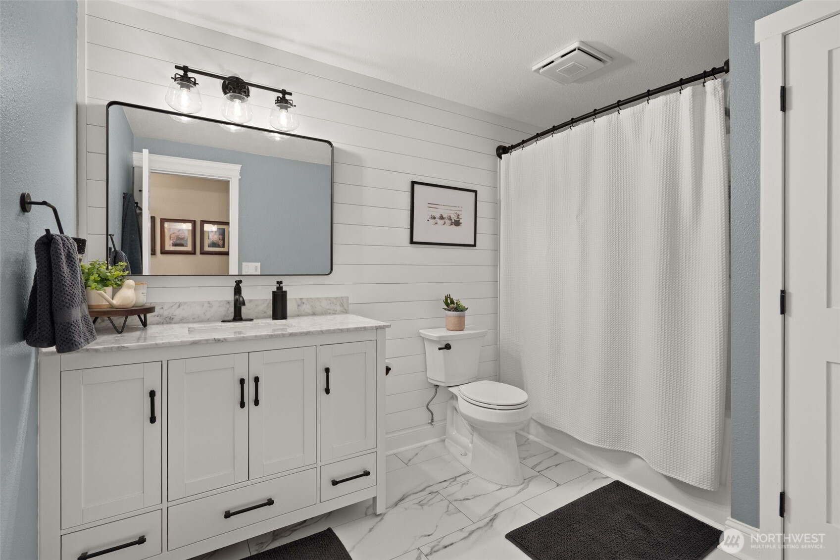 107 Odella Lane Chehalis, WA 98532 - Photo 22 of 37 a bathroom with a toilet a sink a vanity and mirror