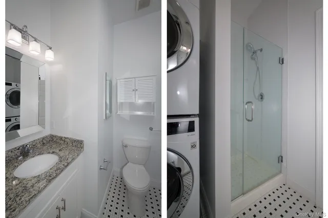 a bathroom with a granite countertop sink a toilet and shower